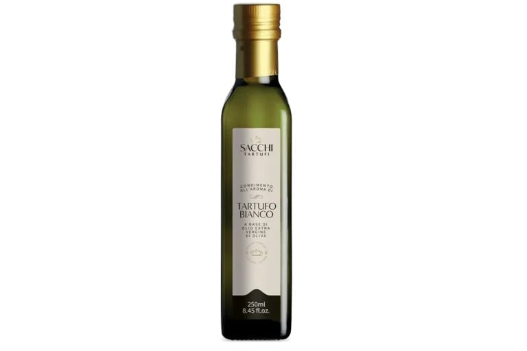 Bottle of Sacchi Tartufo Bianco truffle-infused olive oil with gold cap and cream label on white background