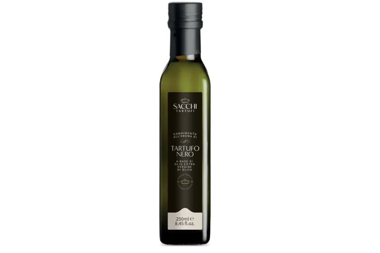 Bottle of Sacch truffle-infused olive oil with dark label and black cap on white background