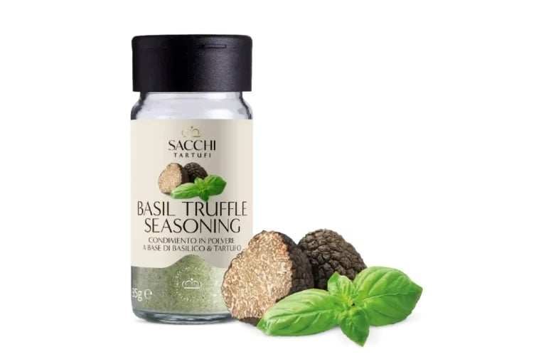 Sacchi basil truffle seasoning jar with fresh basil leaves and truffle pieces displayed beside it